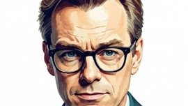 a man wearing glasses and a suit